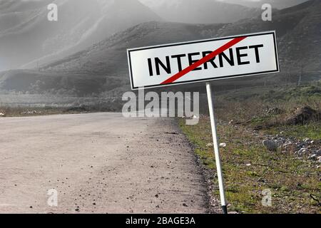 Road and road sign crossed out word "INTERNET". Stock Photo