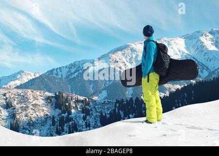 Snowboarder freerider in the mountains Stock Photo