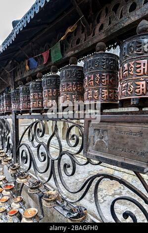 Buddhist prayer wheels at the Swayambhunath pagoda, Kathmandu, Nepal ...