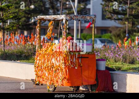 Fresh fruit juices, lemonade vendor stand, Essaouira, Morocco. With selective focus Stock Photo