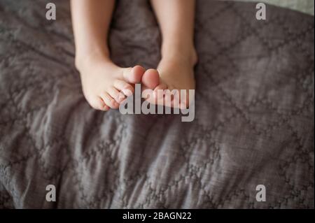 A Boy Touching His Toes Stock Photo - Alamy