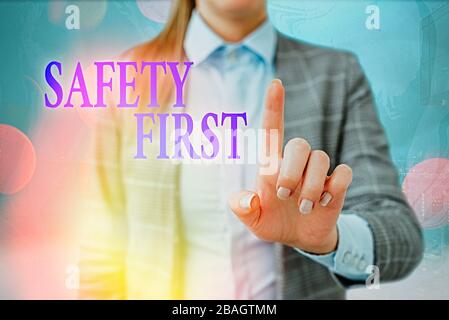 Handwriting text writing Safety First. Conceptual photo used to say that the most important thing is to be safe Stock Photo