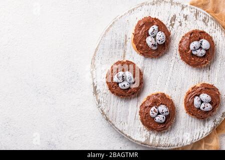 Easter cookies in shape of nest with eggs Stock Photo