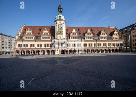 Leipzig, Germany, 03-27-2020, empty restaurants and shops in the city center because of Corona/ market place with Old Town Hall Stock Photo