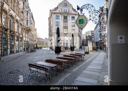 Leipzig, Germany, 03-27-2020, empty restaurants and shops in the city center because of Corona/ Barefoot alley ( Barfußgässchen) Stock Photo