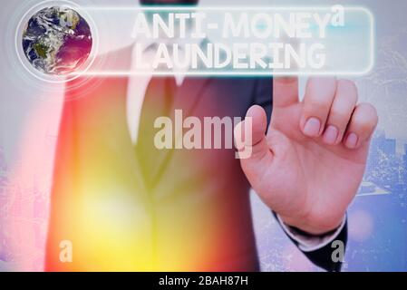 Writing note showing Anti Money Laundering. Business concept for regulations stop generating income through illegal actions Elements of this image fur Stock Photo