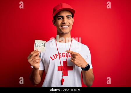 Young Handsome African American Lifeguard Man Wearing Whistle Holding 