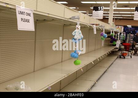 Empty toilet paper aisle at a grocery store in Niles, Illinois during the COVID19 outbreak Stock Photo