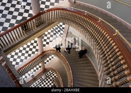 Washington, United States Of America. 25th Mar, 2020. Vice President Mike Pence walks with staff members Wednesday, March 25, 2020, in the Eisenhower Executive Office Building of the White House. People: Vice President Mike Pence Credit: Storms Media Group/Alamy Live News Stock Photo