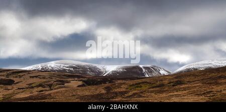 Lowther Hills with winter storm clouds, Dumfries and Galloway, Scotland. Panoramic Stock Photo