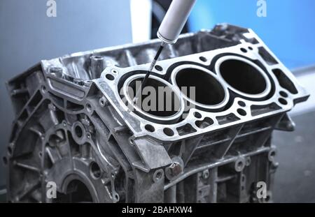 Quality control of drilling, milling aluminium parts of CNC machinery by Coordinate Measuring Machine for automotive parts industrial Stock Photo