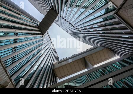 Modern buildings against blue sky Stock Photo