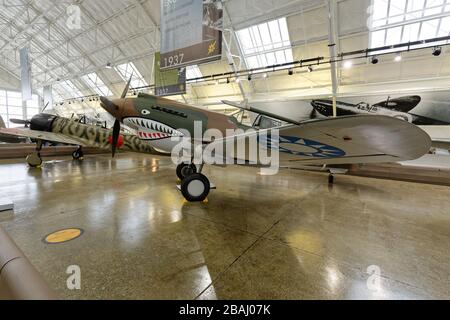 SEPTEMBER 19, 2015, EVERETT, WA: Wide shot of a Curtiss P-40C Tomahawk on display at a Seattle-area museum, seen with its nemesis, a Japanese Zero. Stock Photo