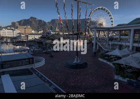 The first day of South Africa's 21 day national lockdown to contain the coronavirus pandemic witnessed a deserted Cape Town V&A Waterfront Stock Photo