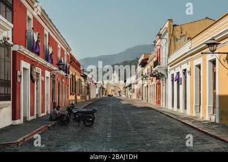 Empty streets as curfew begins in colonial Antigua Guatemala, a popular tourist destination, businesses closed due to coronavirus pandemic quarantine Stock Photo