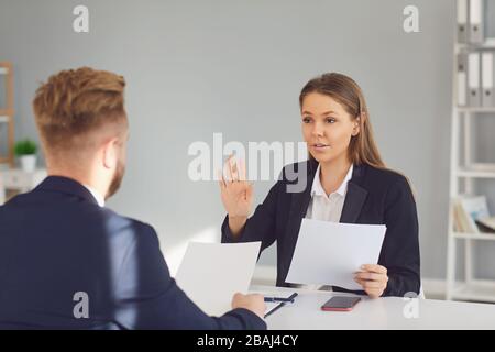 Business people discussing documents in office Stock Photo