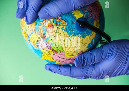 Coronavirus or Covid-19 epidemic healthcare concept on mint green pastel background with copy space Stock Photo