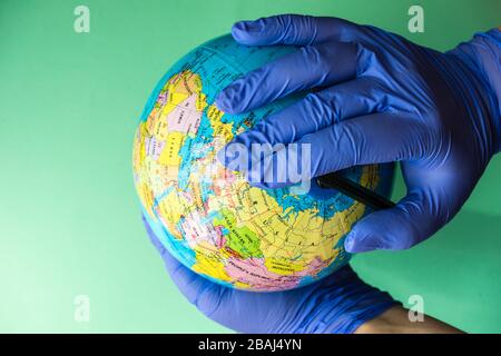 Coronavirus or Covid-19 epidemic healthcare concept on mint green pastel background with copy space Stock Photo