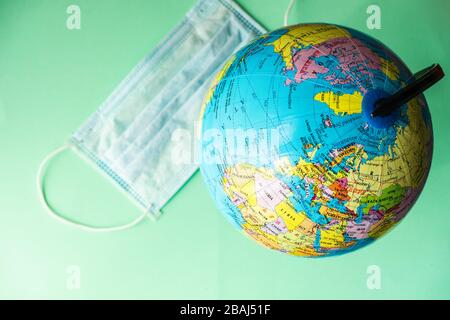 Coronavirus or Covid-19 epidemic healthcare concept on mint green pastel background with copy space Stock Photo