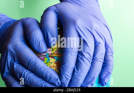 Coronavirus or Covid-19 epidemic healthcare concept on mint green pastel background with copy space Stock Photo