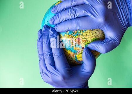 Coronavirus or Covid-19 epidemic healthcare concept on mint green pastel background with copy space Stock Photo