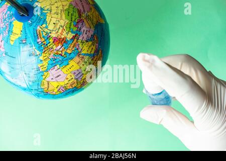 Coronavirus or Covid-19 epidemic healthcare concept on mint green pastel background with copy space Stock Photo