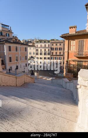 ROME, ITALY - 12 March 2020: A man climbs up the popular Spanish Steps deserted today, a rare sight in Rome, Italy. Today, the Italian government decr Stock Photo