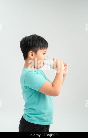 A drinking milk boy on the white background. Stock Photo