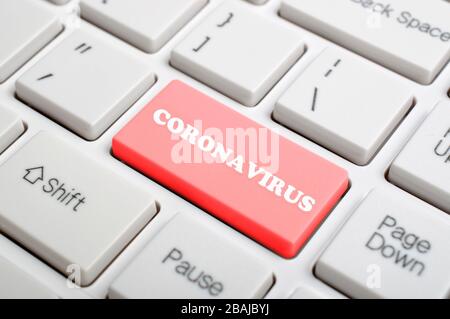 Coronavirus key on keyboard Stock Photo