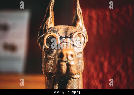 Vilnius, Lithuania - July 7, 2016: Close View Of Bronze Sculpture Of Dog In Glasses Near Optician Shop. Stock Photo