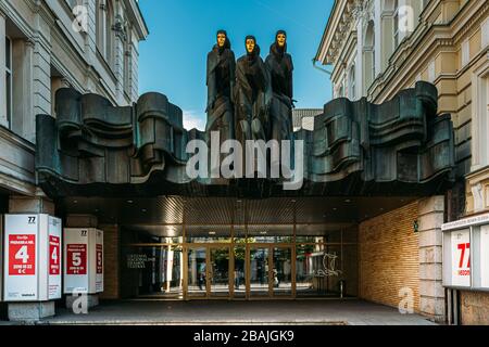 Vilnius, Lithuania, Eastern Europe - July 7, 2016: Sculpture Of Three Muses On Facade Of Lithuanian National Drama Theatre Building, Main Entrance Stock Photo