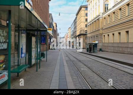 Helsinki, Finland. March 28, 2020. Aleksanterinkatu, one of the busiest shopping streets in Helsinki, is very quiet due to the coronavirus pandemic. Stock Photo