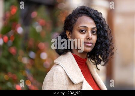 Beautiful young woman having fun on the Christmas Market Stock Photo