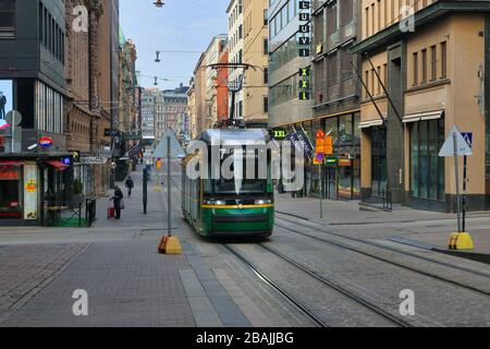Helsinki, Finland. March 28, 2020. Aleksanterinkatu, one of the busiest shopping streets in Helsinki, is very quiet due to the coronavirus pandemic. Stock Photo