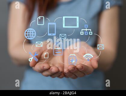 cloud connected to many objects on a virtual screen Stock Photo