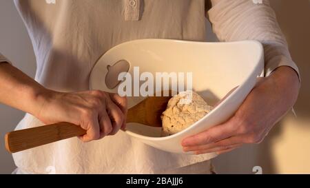 Close-up of hands kneading bread dough Stock Photo