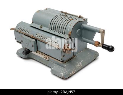 Isolated objects: grey vintage mechanical pinwheel calculator, on white background Stock Photo