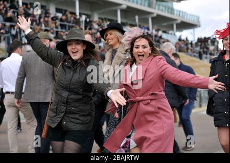Crowds gather at Cheltenham Racecourse for the 2020 Festival of racing, one of the last big public gatherings under the cloud of coronavirus covid-19 Stock Photo