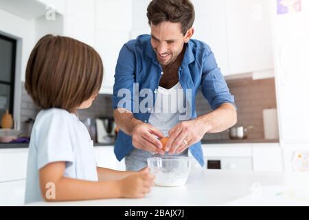 Father and son in the kitchen Stock Photo