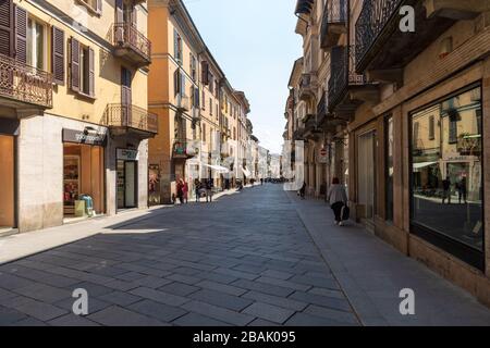 View along street in old town of Pavia, Lombardy region in Italy Stock Photo