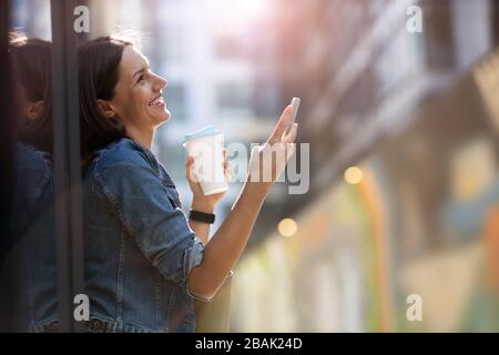 Portrait of young woman in urban area Stock Photo