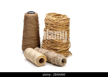 image of four spools of coarse thread for needlework Stock Photo