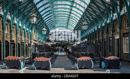 Carts and carriages at a deserted Covent Garden during the lockdown in London following the coronavirus pandemic. Stock Photo