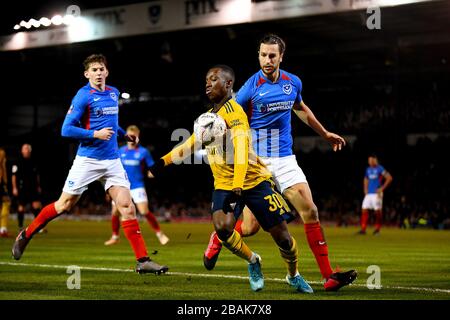 Edward Nketiah of Arsenal and Christian Burgess of Portsmouth in action - Portsmouth v Arsenal, The Emirates FA Cup fifth round, Fratton Park, Portsmouth, UK - 2nd March 2020  Editorial Use Only - DataCo restrictions apply Stock Photo