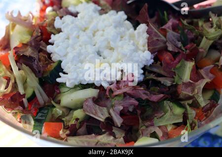 Traditional Finnish summer cottage food every Finn loves to enjoy during midsummer fest and summertime in general. Delicious homemade salad. Stock Photo