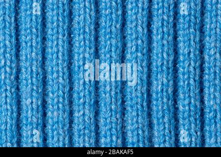Blue knitted fabric background texture for design, trend color classic blue. Stock Photo