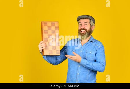 Grandmaster experienced player. Cognitive development. Teacher chess competition. Board game. Bearded man playing chess. Chess figures. Intellectual games. Game strategy concept. Chess lesson. Stock Photo