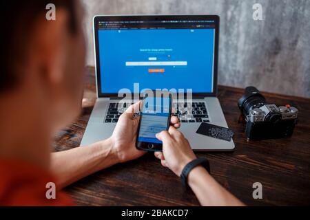 A man buys tickets for a trip online for a computer. Online opalat with credit cards. booking air tickets online Stock Photo