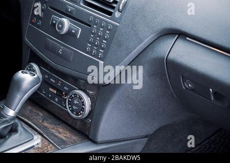 Automatic transmission gear, car interior. Automatic gear stick of a modern car, interior details, close up. Car detailing. Transmission lever Stock Photo