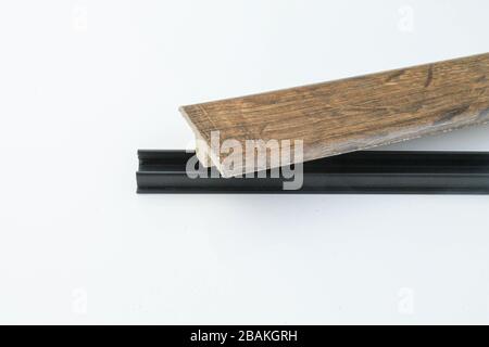 Interior threshold. A joint connecting floor coverings. without visible mounts. Stock Photo